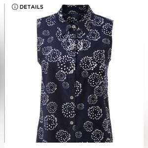 Cabi #5215 Wish Top. Size small. Navy and white peplum back.